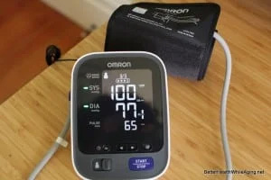 omron blood pressure monitor in use