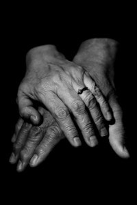 Hands of older couple